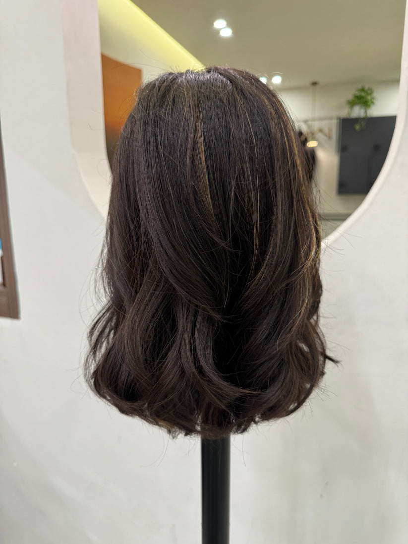 Back view of 14 inch brown bob wig showing dimensional balayage and hair texture