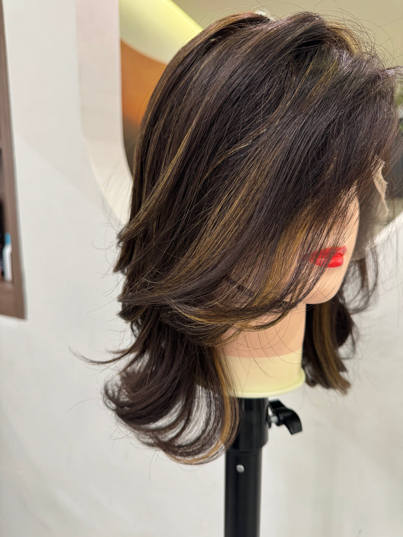 Front view of chocolate brown bob wig with hand-tied lace top and natural hairline