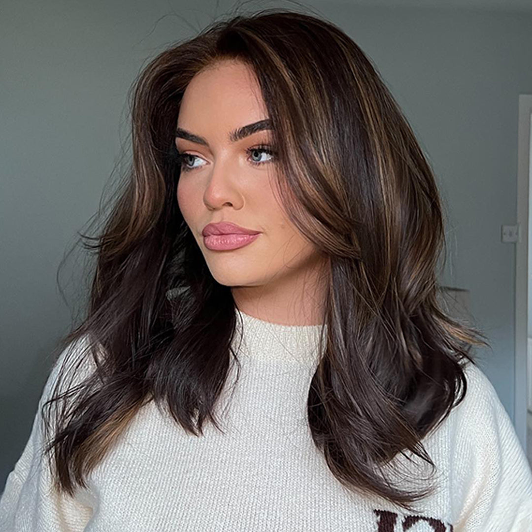 Woman in Sharon brown balayage wig white turtleneck winter style